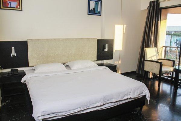 Hotel Aristro Lonavala Rum bild